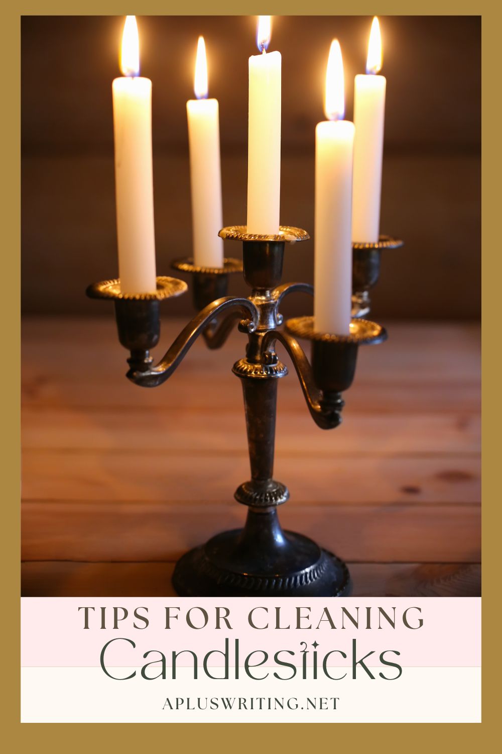 A candlestick holder with 5 lit candles 