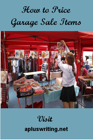 Woman arranging items at her garage sale