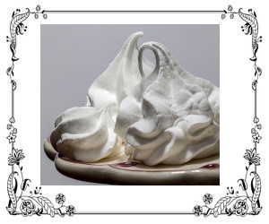 A dollop of whipped cream on a plate
