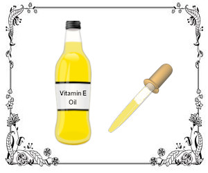 Bottle of Olive oil and a medicine dropper.