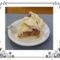 A slice of apple pie on a white plate with fork