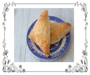 Blueberry walnut turnovers on a plate.
