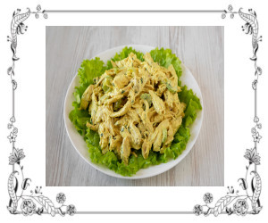 Curried chicken salad on a bed of lettuce