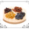 4 Types of Raisins on a Cutting Board