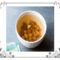 Bowl of golden raisins soaking in water