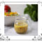 A cruet of honey mustard salad dressing