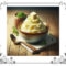 A dish with mashed potatoes with a pat of butter on top.